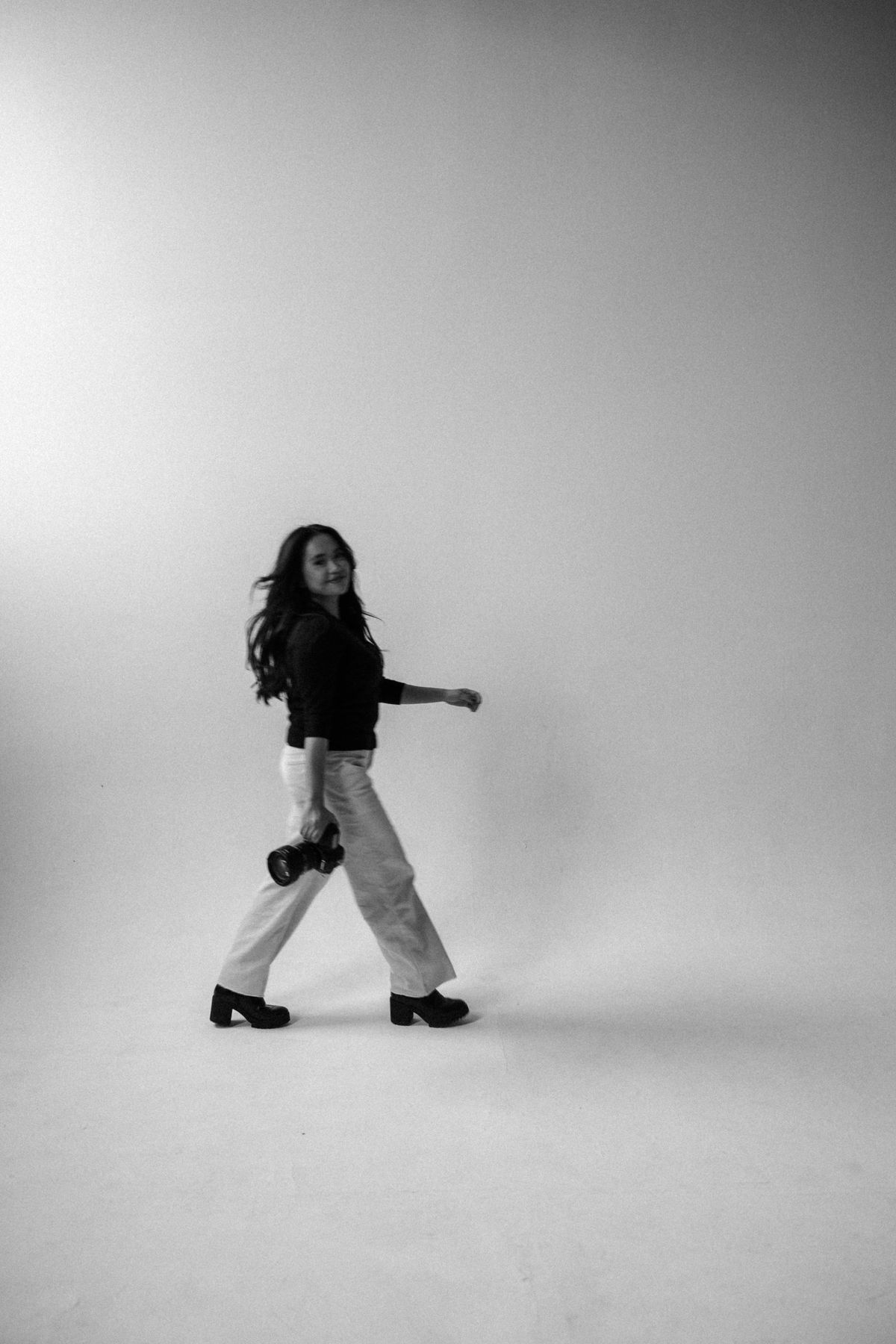 Movement on the studio backdrop, black and white