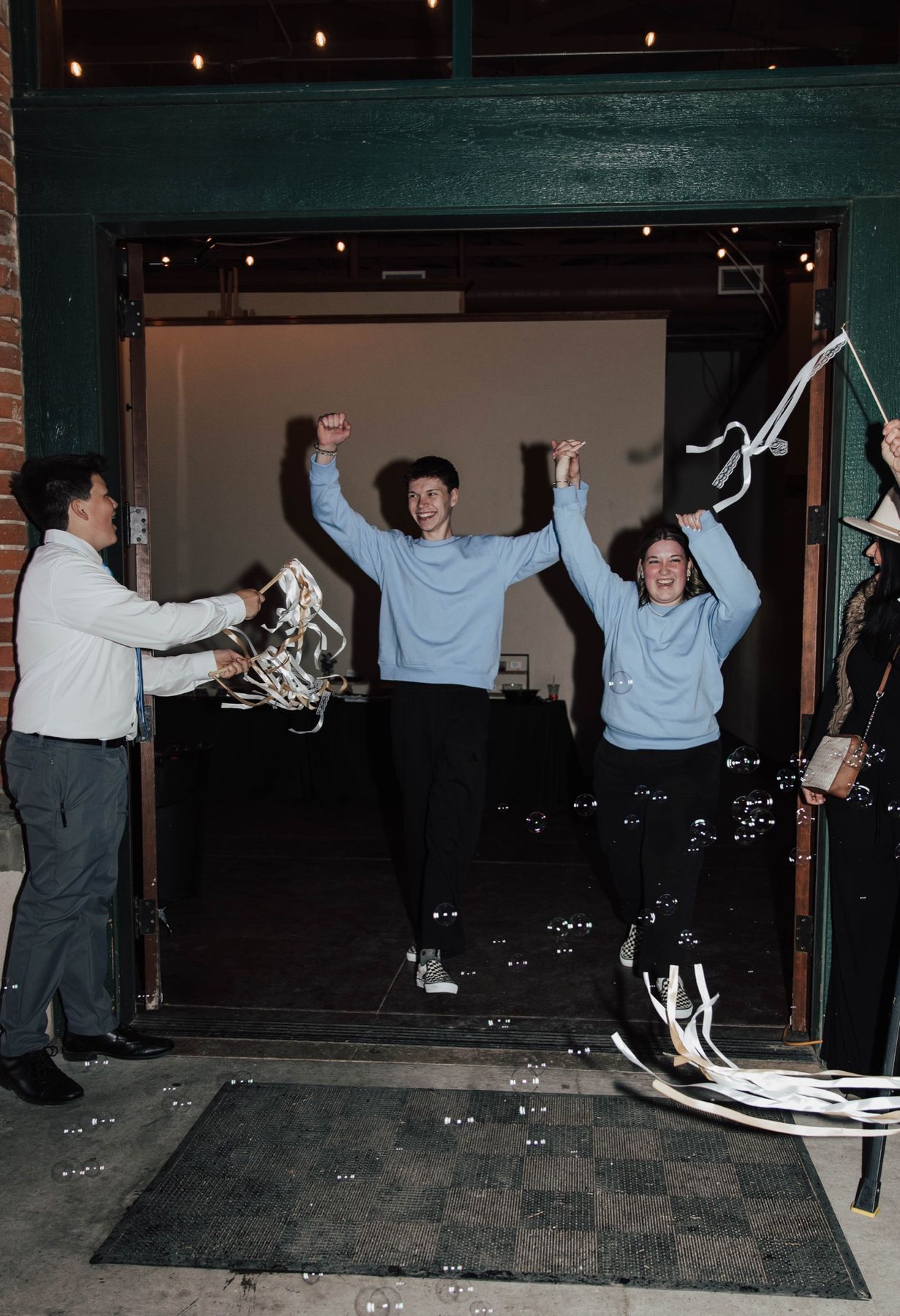 Streamers and cheers at the reception exit