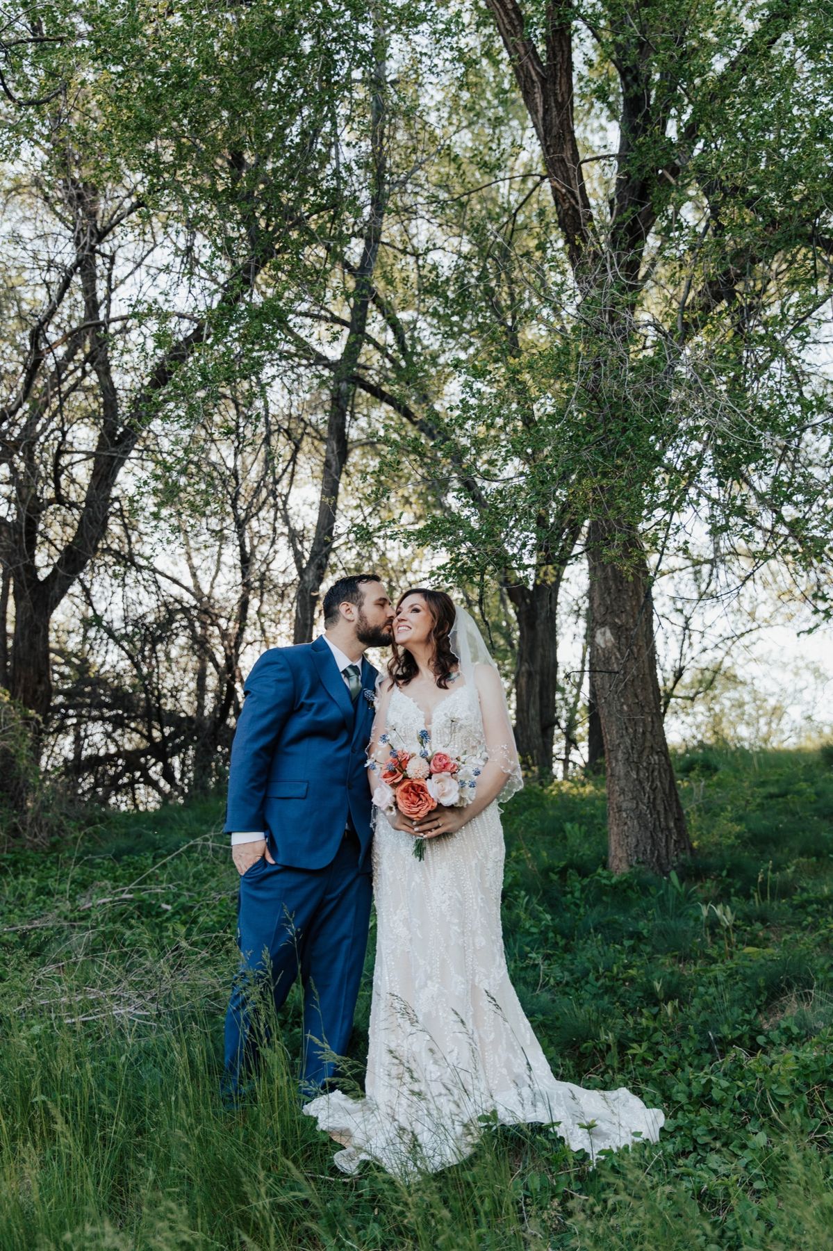 Newlyweds among spring trees