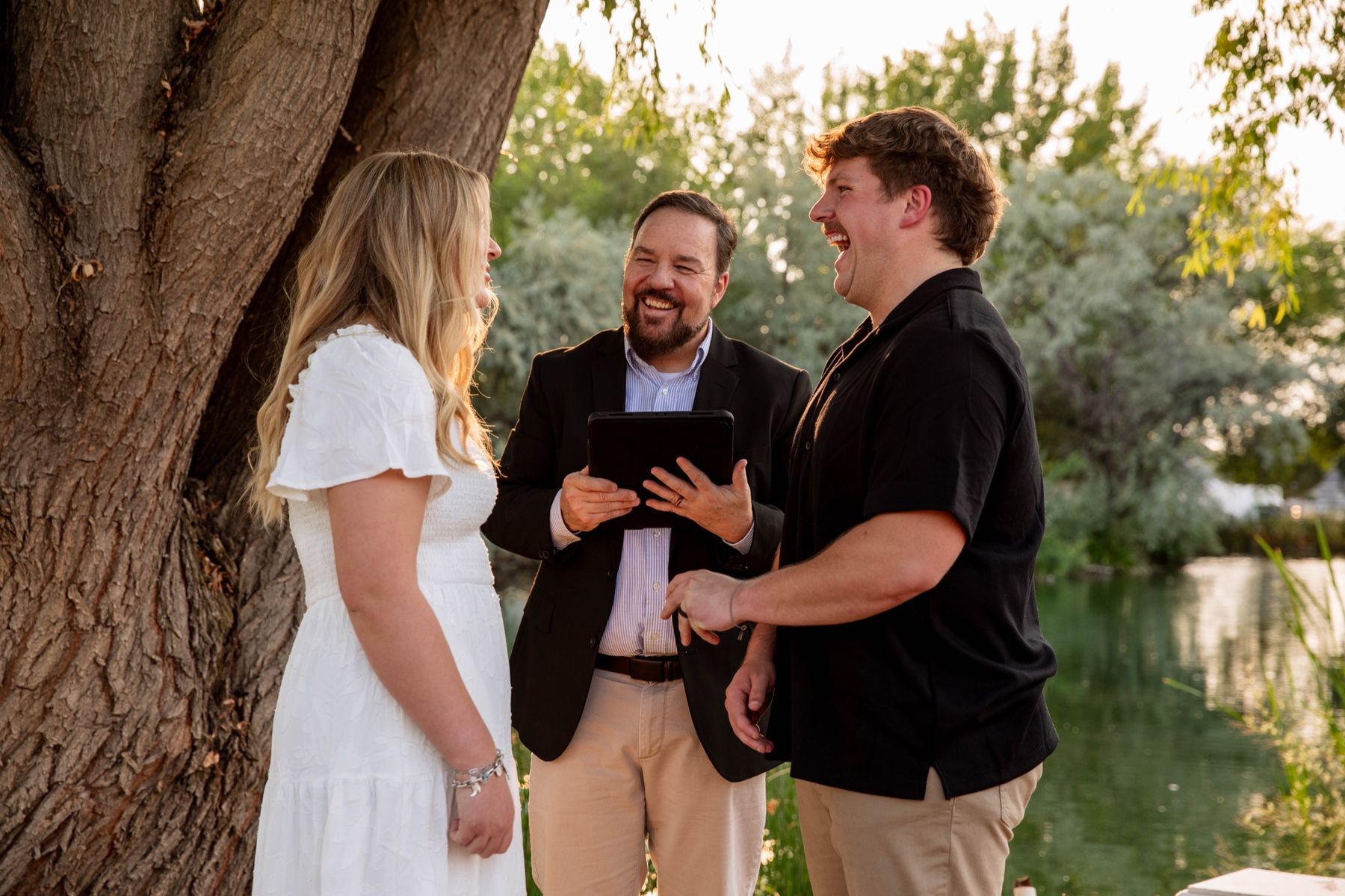 Vows under the old tree by the pond